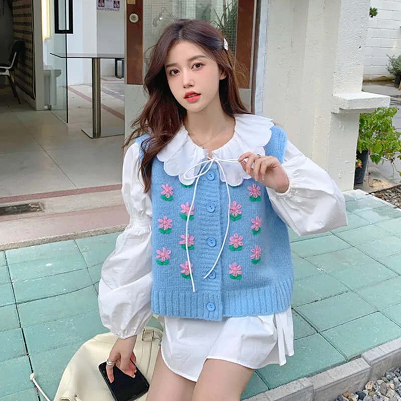 light blue knitted vest