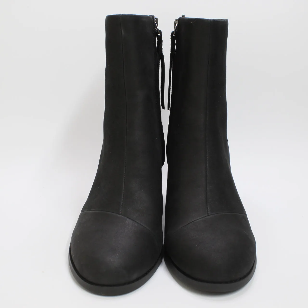 Toms Black Leather Heeled Boots for Women.