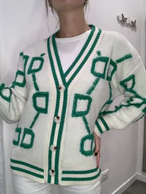 White cardigan with green embroidery