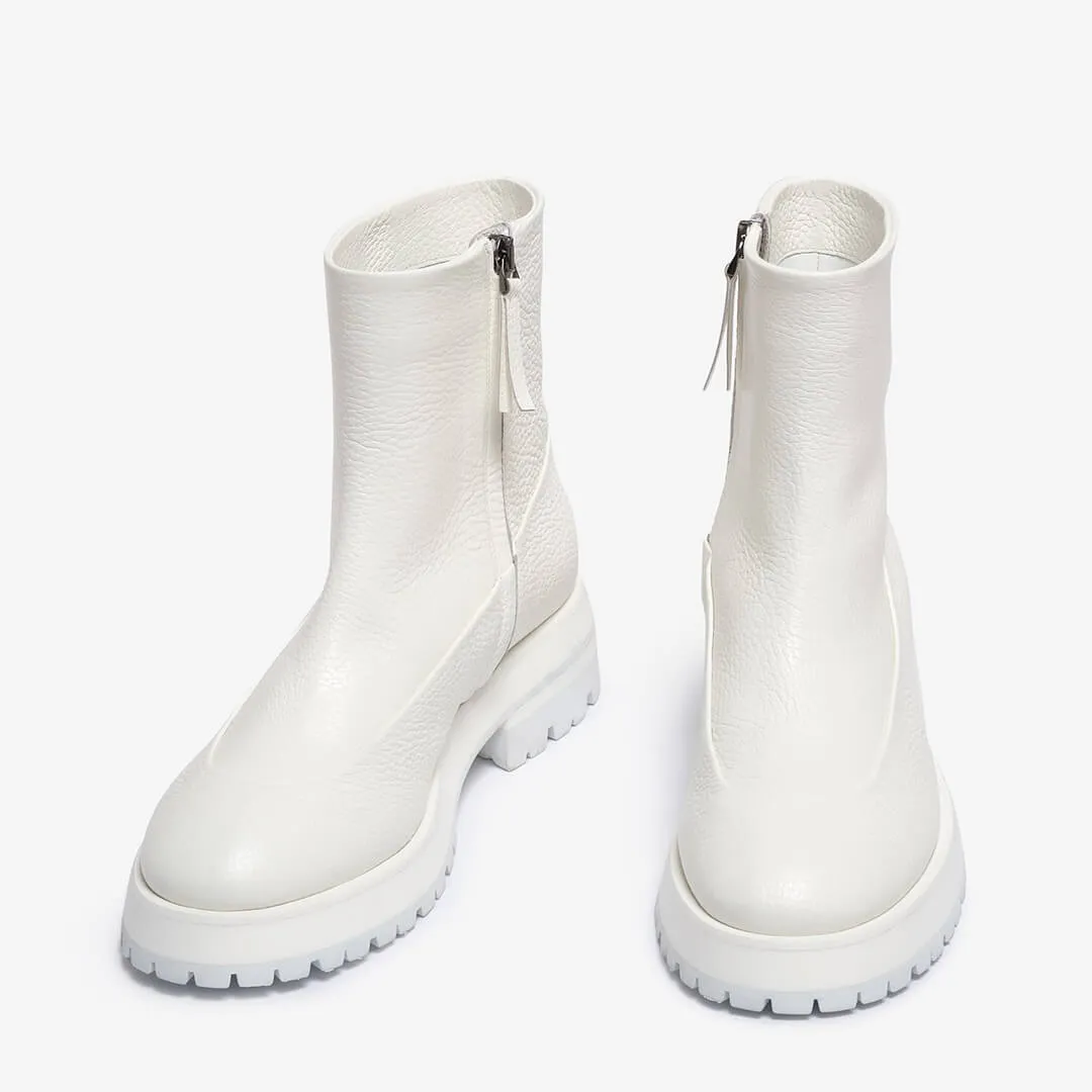 White women's leather ankle boot for sale.